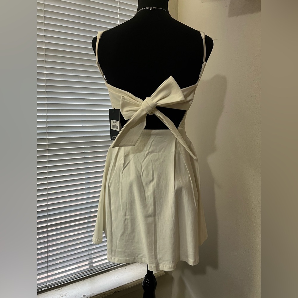 Chic White Sleeveless Mini Dress - Picture 7 of 16